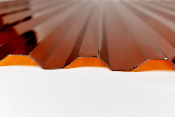 Профилированный монолитный поликарбонат 1,0мм трапеция 1050*6000мм БРОНЗА (ЯНТАРЬ)Юг-ойл- пласт